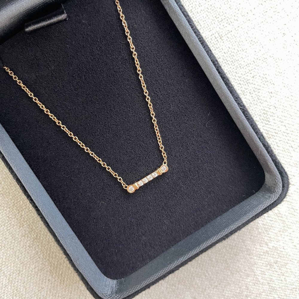 SOLD - Tiffany & Co. Fleur de Lis Key Bar Pendant Necklace